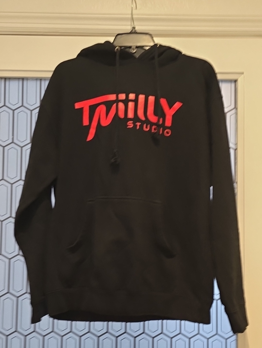 Black TMILLY Studio Hoodie with Red Logo